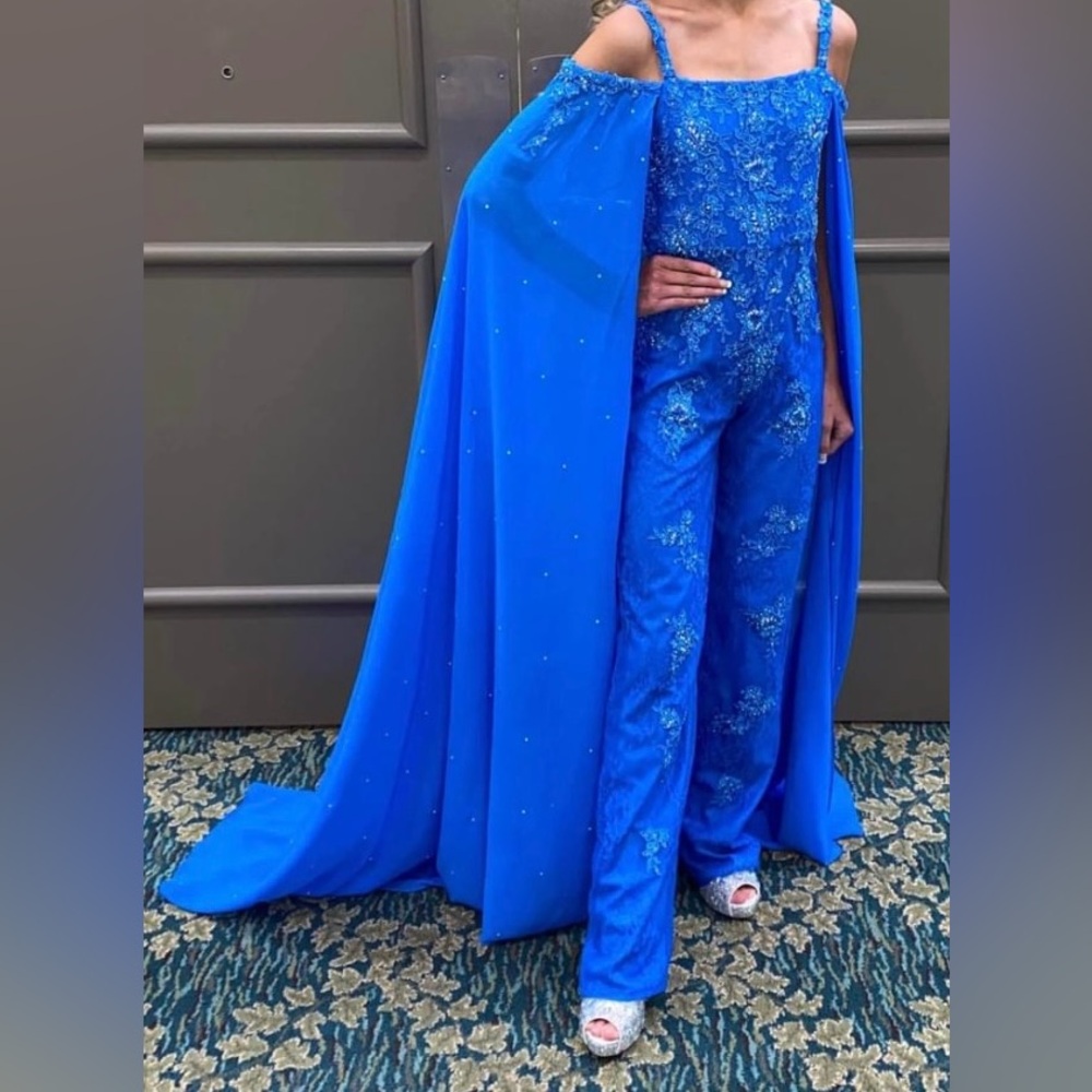 Beautiful blue fun fashion size 10! Fits like a size 10/12 worn for fun fashion